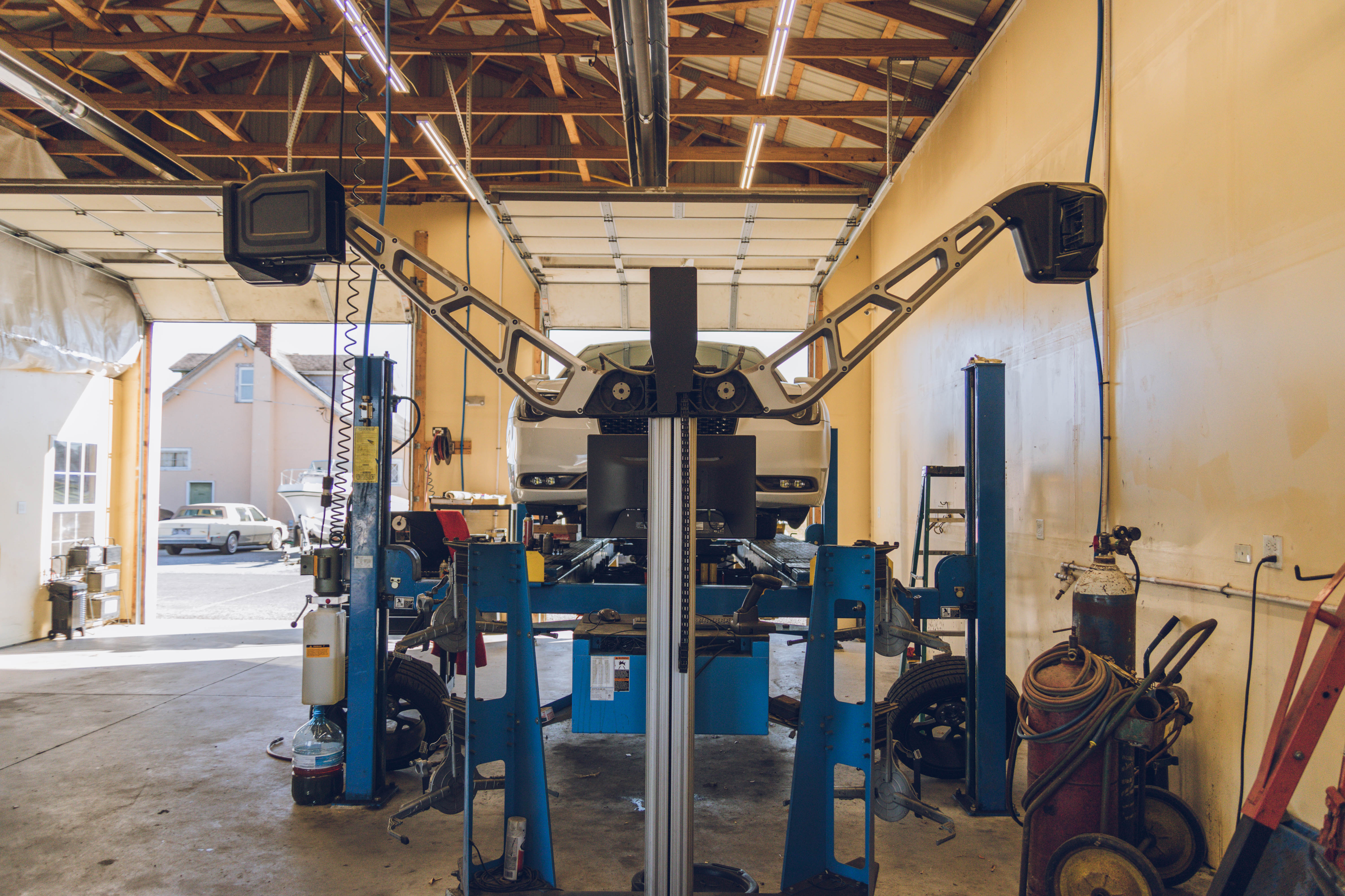 vehicle getting an aligment All wheel and front wheel Alignments